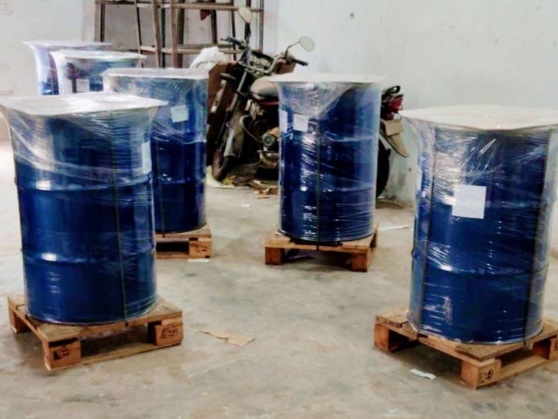 Sealed drums of recovered converter material wrapped for despatch